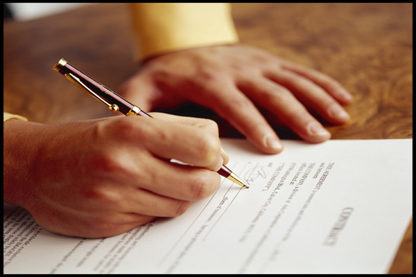 Man Signing Contract